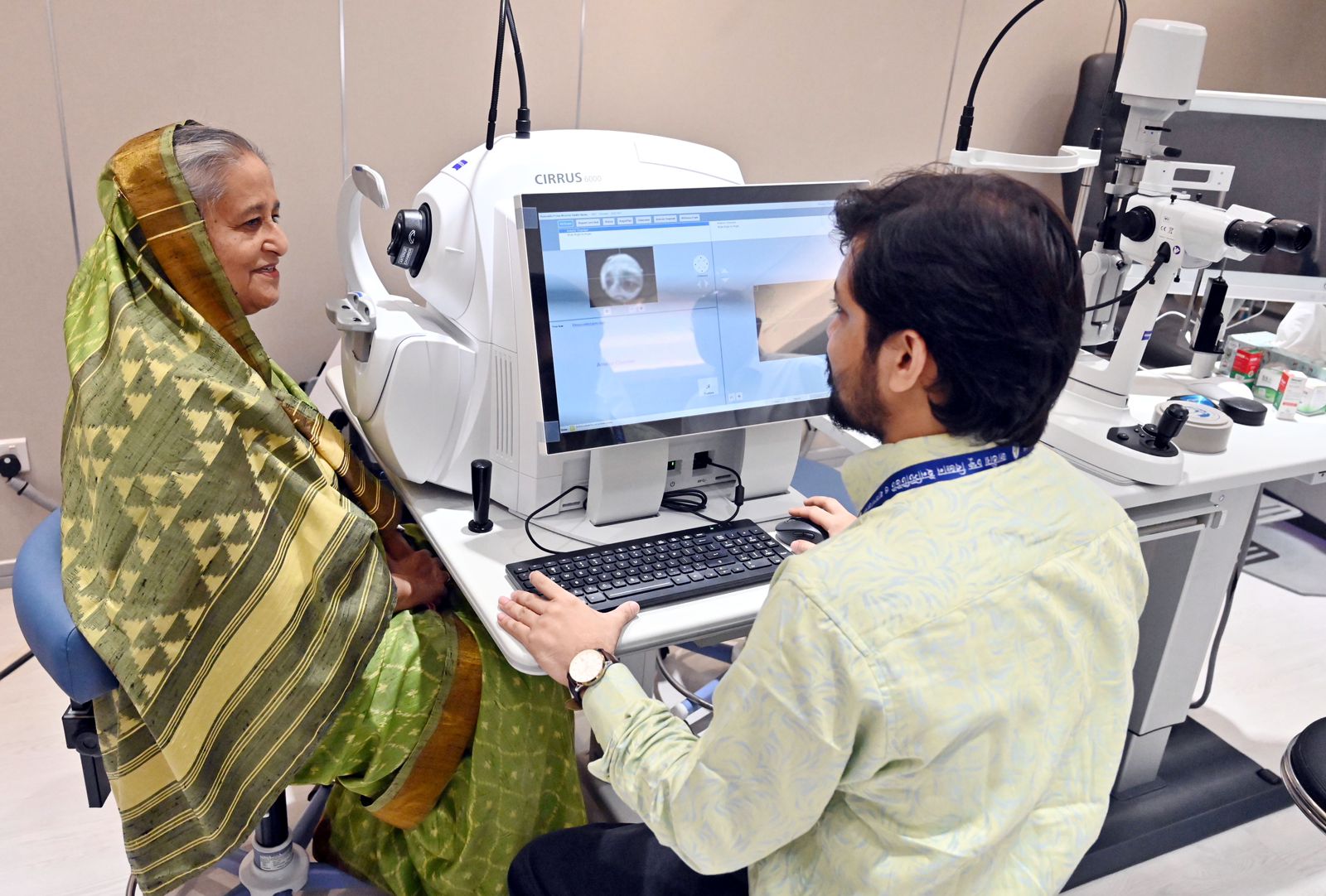লাইনে দাঁড়িয়ে টিকিট কেটে চোখ পরীক্ষা করালেন প্রধানমন্ত্রী