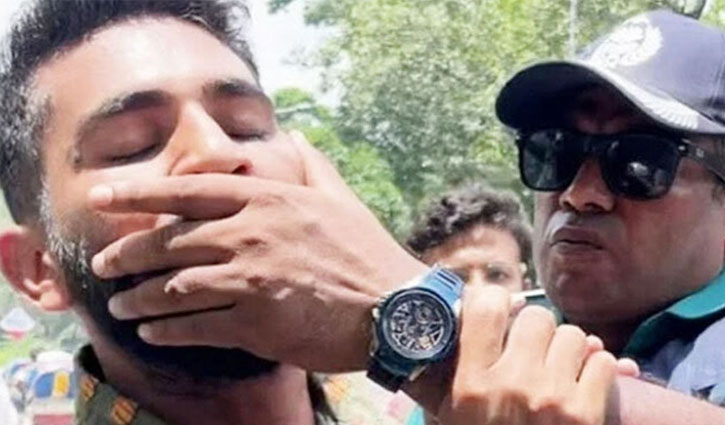 শিক্ষার্থীর মুখ চেপে ধরা সেই ওসি বরখাস্ত